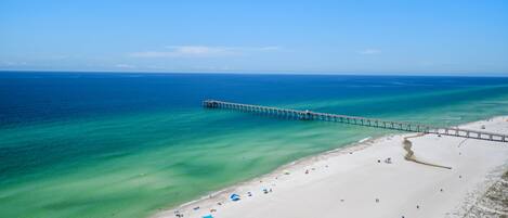 On the beach, sun-loungers, beach towels