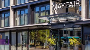 A modern building with the name 'Mayfair' prominently displayed. - The Mayfair (Christchurch)