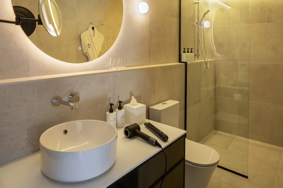 shower, designer toiletries, hair dryer, dressing gowns
