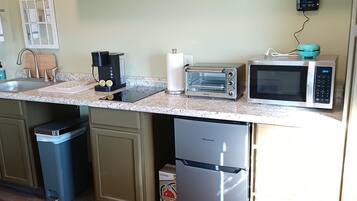 Fridge, microwave, coffee/tea maker, toaster