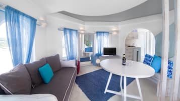 Basic Triple Room | Living area | 32-inch Smart TV with satellite channels, TV