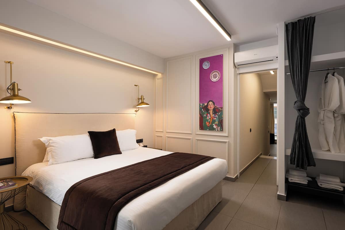 Family Suite - Building 2 | Premium bedding, minibar, in-room safe, individually decorated
