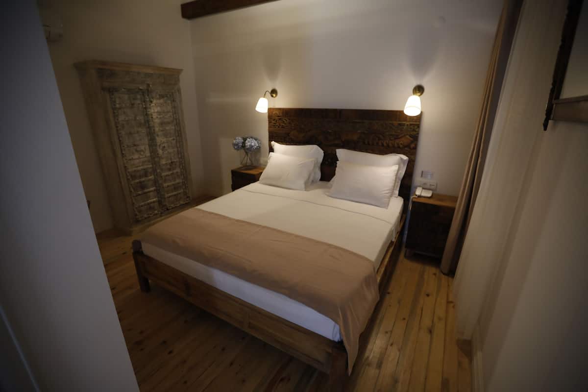 Luxe kamer | Lakens van Egyptisch katoen, luxe beddengoed, een gratis minibar