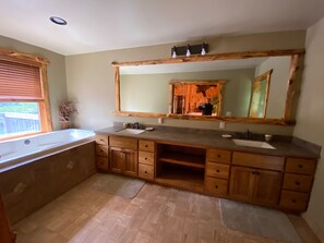 Combined shower/bathtub, jetted bath, toilet paper