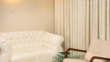 Apartment, 1 Bedroom | Living area | Flat-screen TV