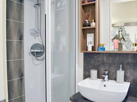 Cabin | Bathroom | Combined shower/tub, deep soaking tub, hair dryer, towels