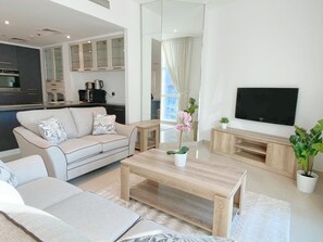 41-inch LED TV with cable channels, TV - EVA - 2BR Apt in the heart of Dubai (Dubai)