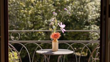 Signature Double Room, River View, Garden Area | Balcony view