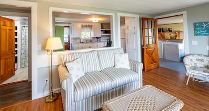 Recently updated cottage featuring beautiful easterly views of Casco Bay