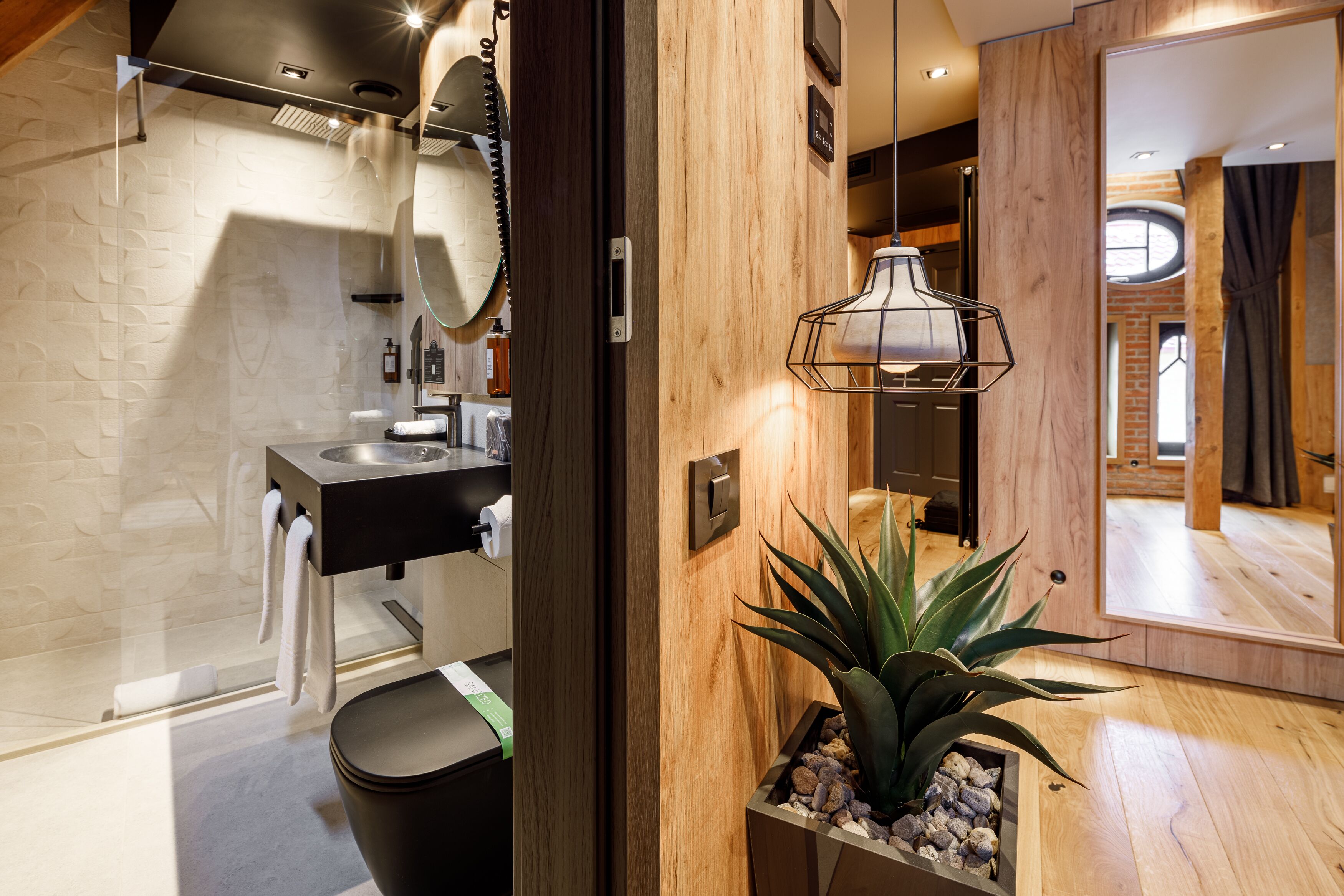 junior studio suite | bathroom | shower, rainfall showerhead, hair dryer, slippers