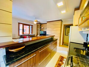 Standard Apartment | Private kitchen | Fridge, microwave, cookware/dishes/utensils