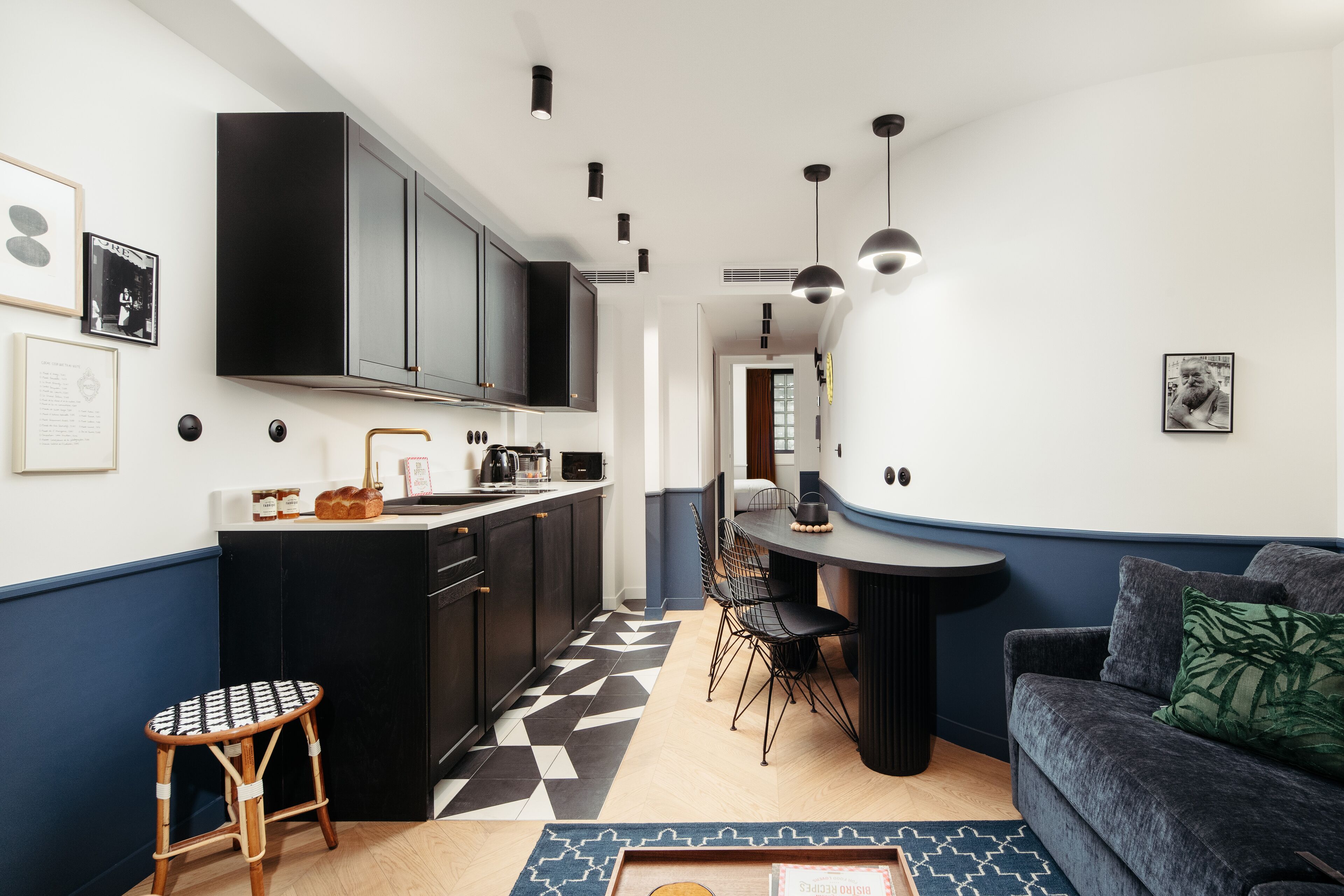 1-br deluxe apartment courtyard view | living area | 32-inch smart tv with cable channels, tv, printers