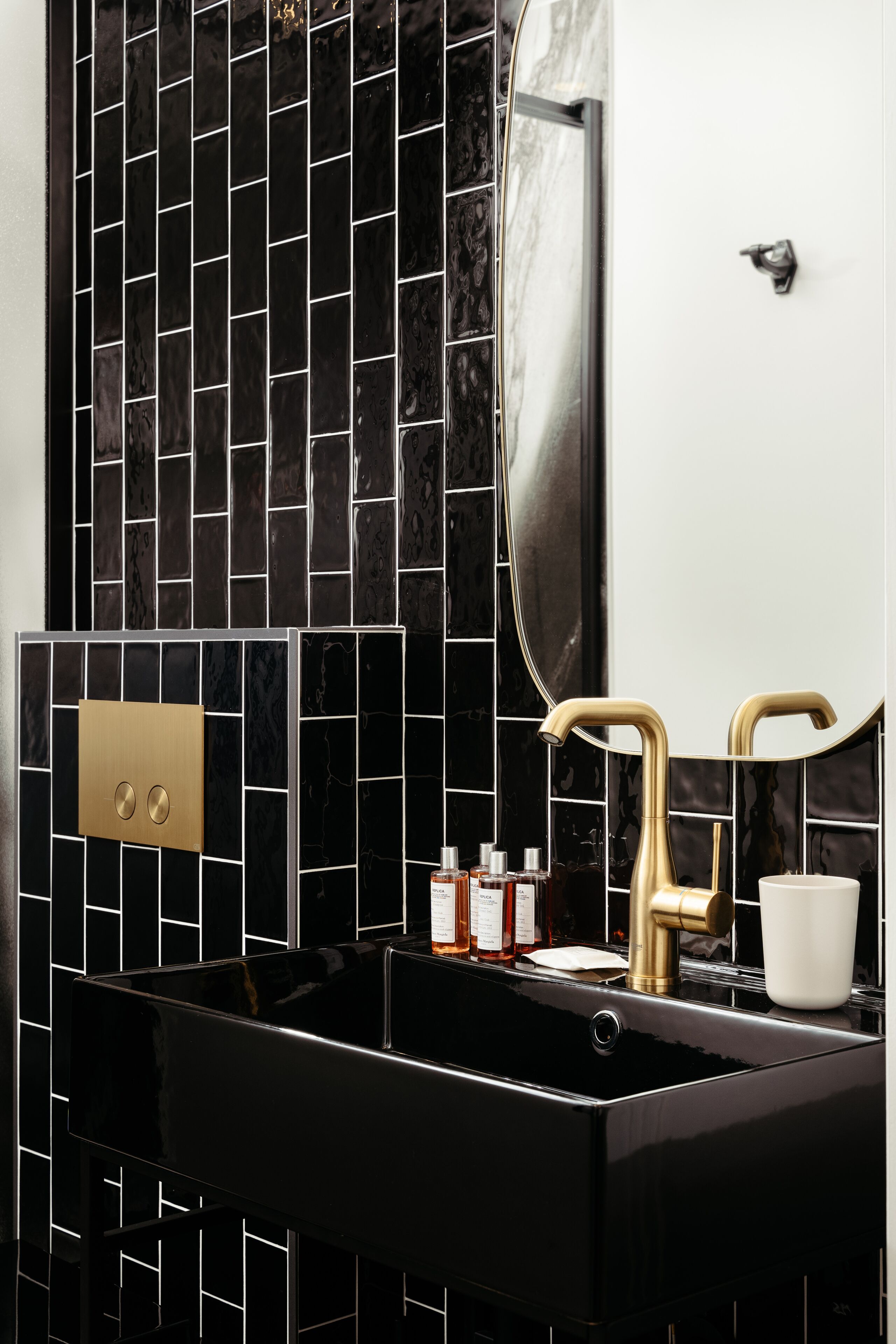 1-br atelier apartment | bathroom | shower, rainfall showerhead, designer toiletries, hair dryer