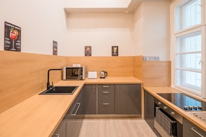 Departamento urbano | 1 habitación, escritorio, wifi gratis y ropa de cama