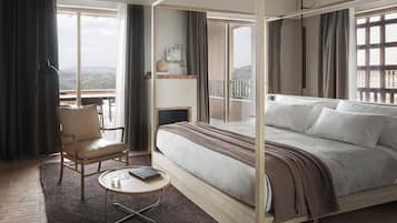 Italiaanse Frette-lakens, luxe beddengoed, donzen dekbedden, een minibar