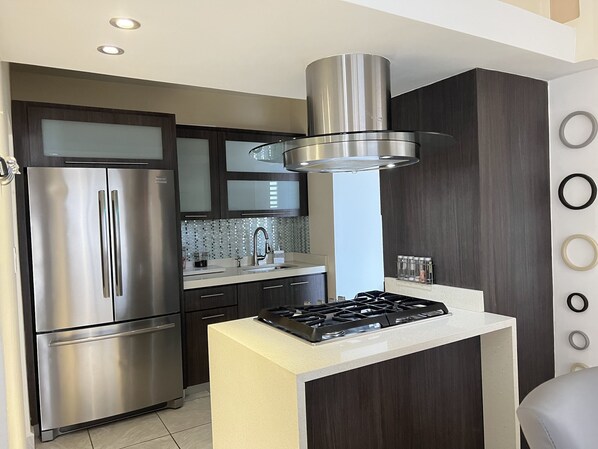 Fridge, microwave, coffee/tea maker, toaster
