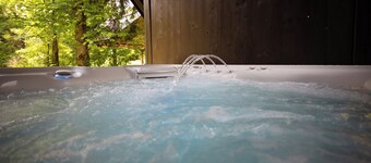 A place where you can relax in hot tub and enjoy the beautiful natur