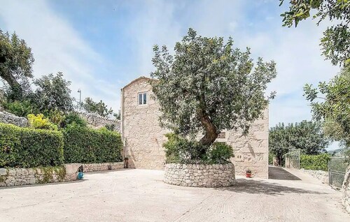 Secluded old farmhouse with a view and pool to relax in total quiet.