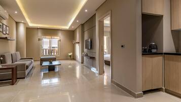 Departamento Deluxe, 1 habitación | Minibar, caja de seguridad en la habitación, escritorio y wifi gratis