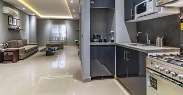 Deluxe Apartment, 1 Bedroom | Minibar, in-room safe, desk, free WiFi