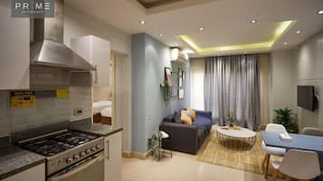 Apartemen, 2 kamar tidur | Minibar, brankas, meja kerja, dan Wi-Fi gratis