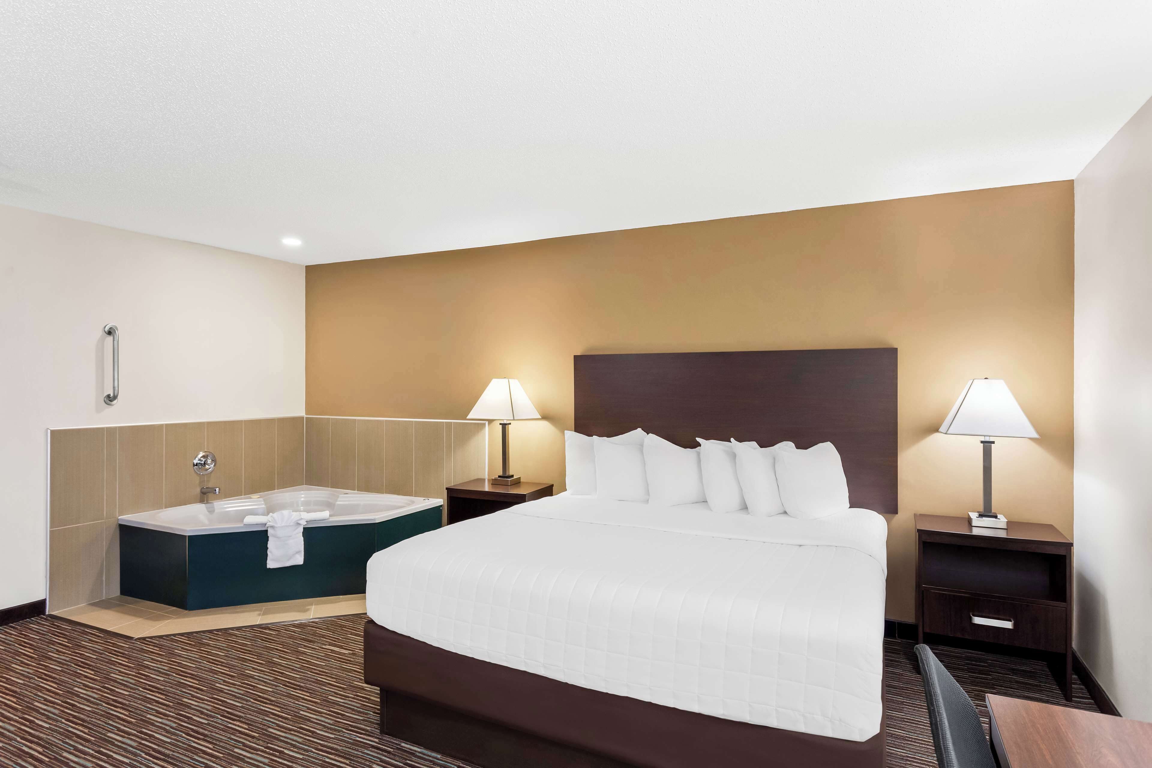 desk, laptop workspace, blackout curtains, iron/ironing board