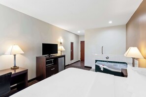 Suite, 1 cama King size, para no fumadores, hidromasaje | Escritorio, espacio para trabajar con laptop y cortinas blackout 