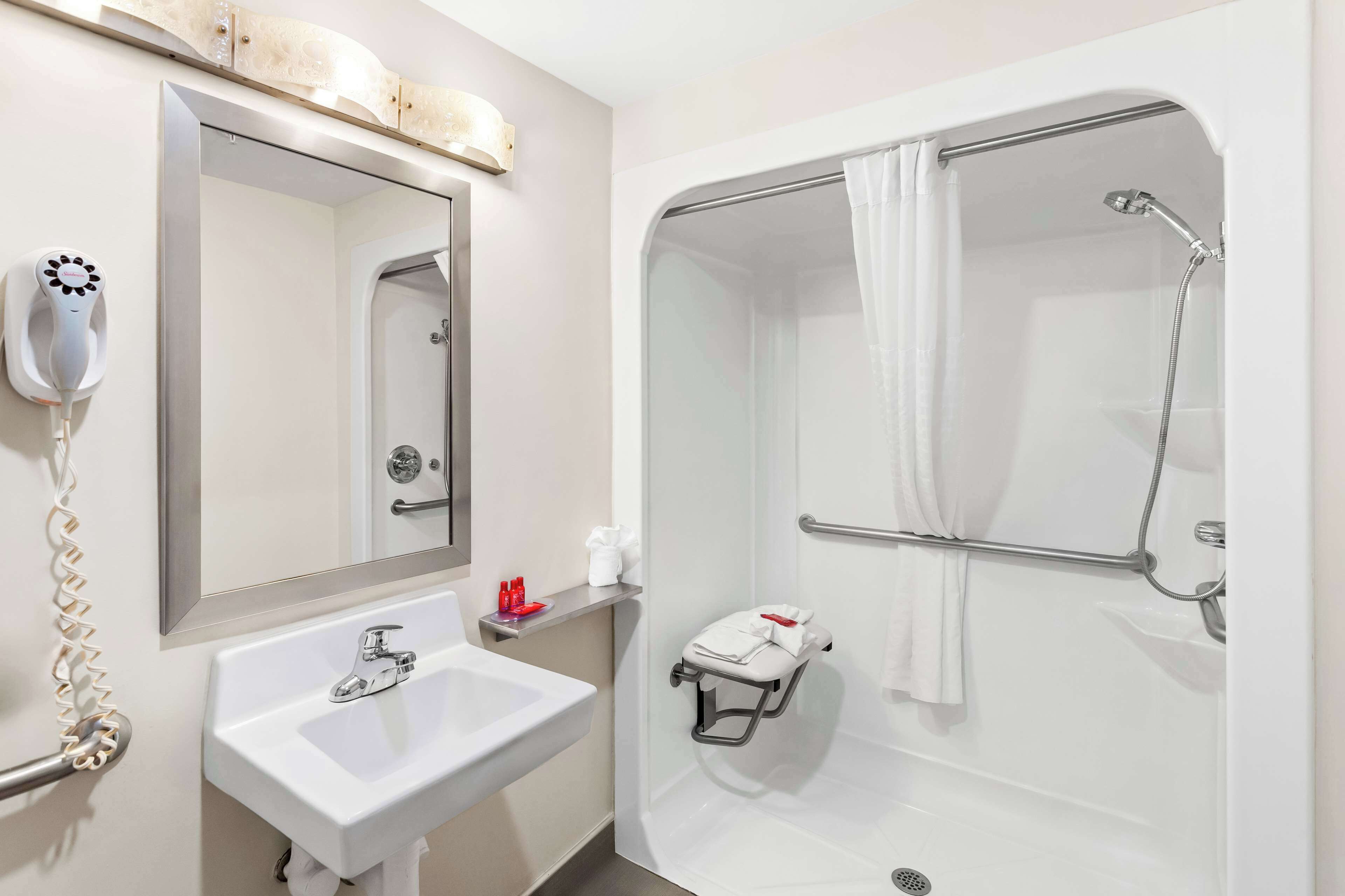 standard room, 1 king bed, accessible, refrigerator & microwave (walk-in shower) | bathroom | combined shower/bathtub, free toiletries, hair dryer, towels