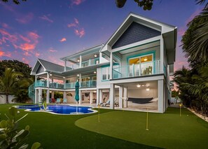 Exterior - Snook Lookout: Canal Home, Pool, Game Room, Putting Green by Anna Maria Life Vacation Rentals (Anna Maria)