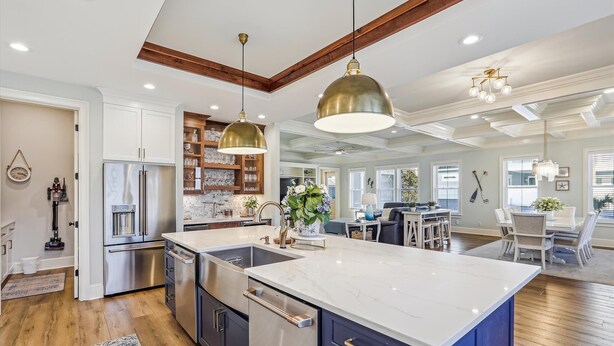 A spacious kitchen with a large island, stainless steel appliances, and a modern pendant light. - 3 Shore Crest, Chefs Kitchen, Free Golf, Game Room, Beach, Pool (Hilton Head)