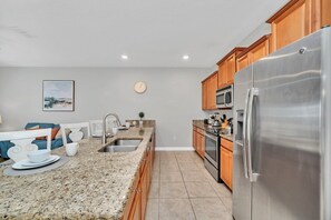Villa (4 Bedrooms) | Private kitchen | Microwave, oven, stovetop, dishwasher
