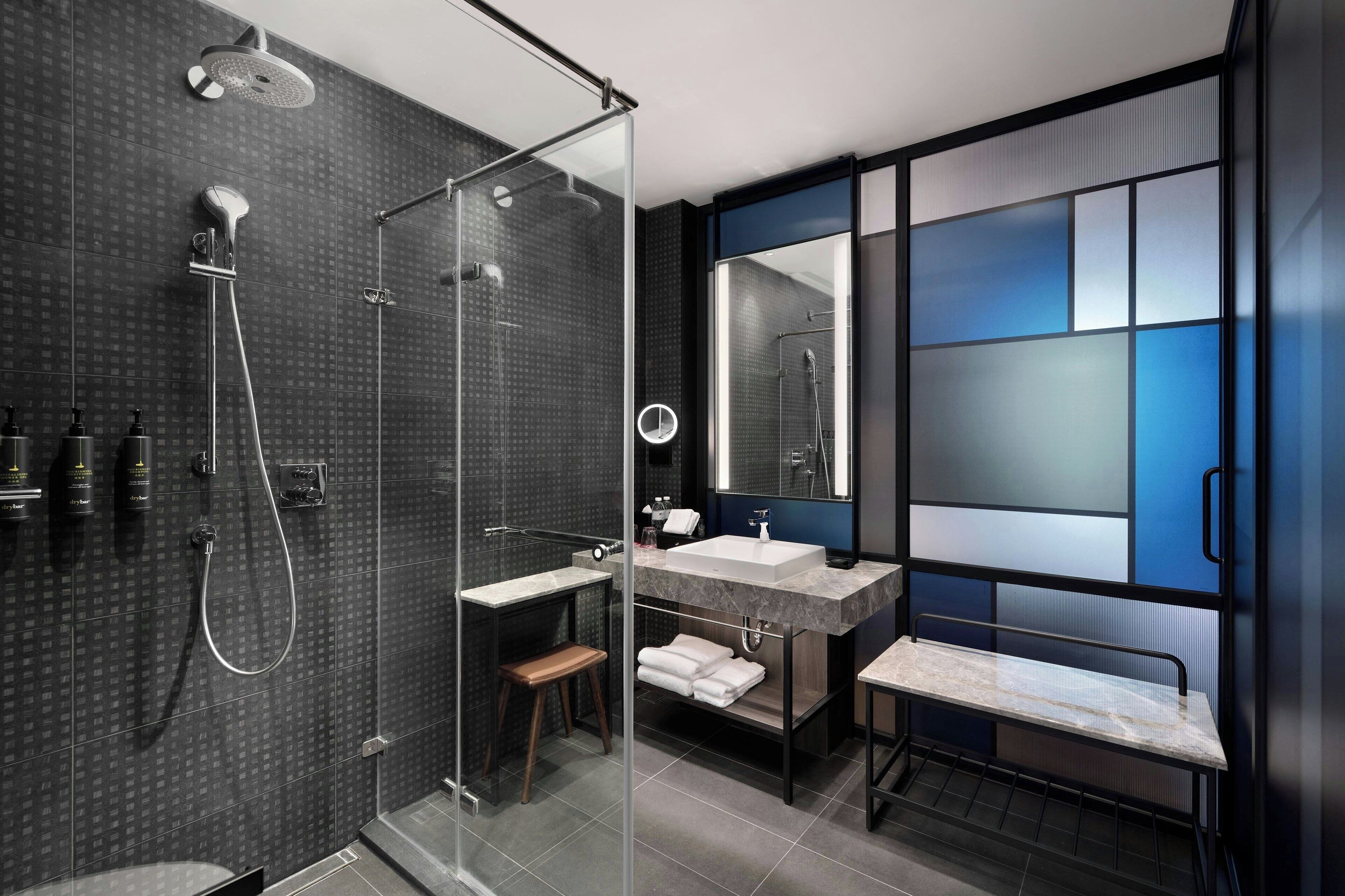 hair dryer, slippers, towels, shampoo