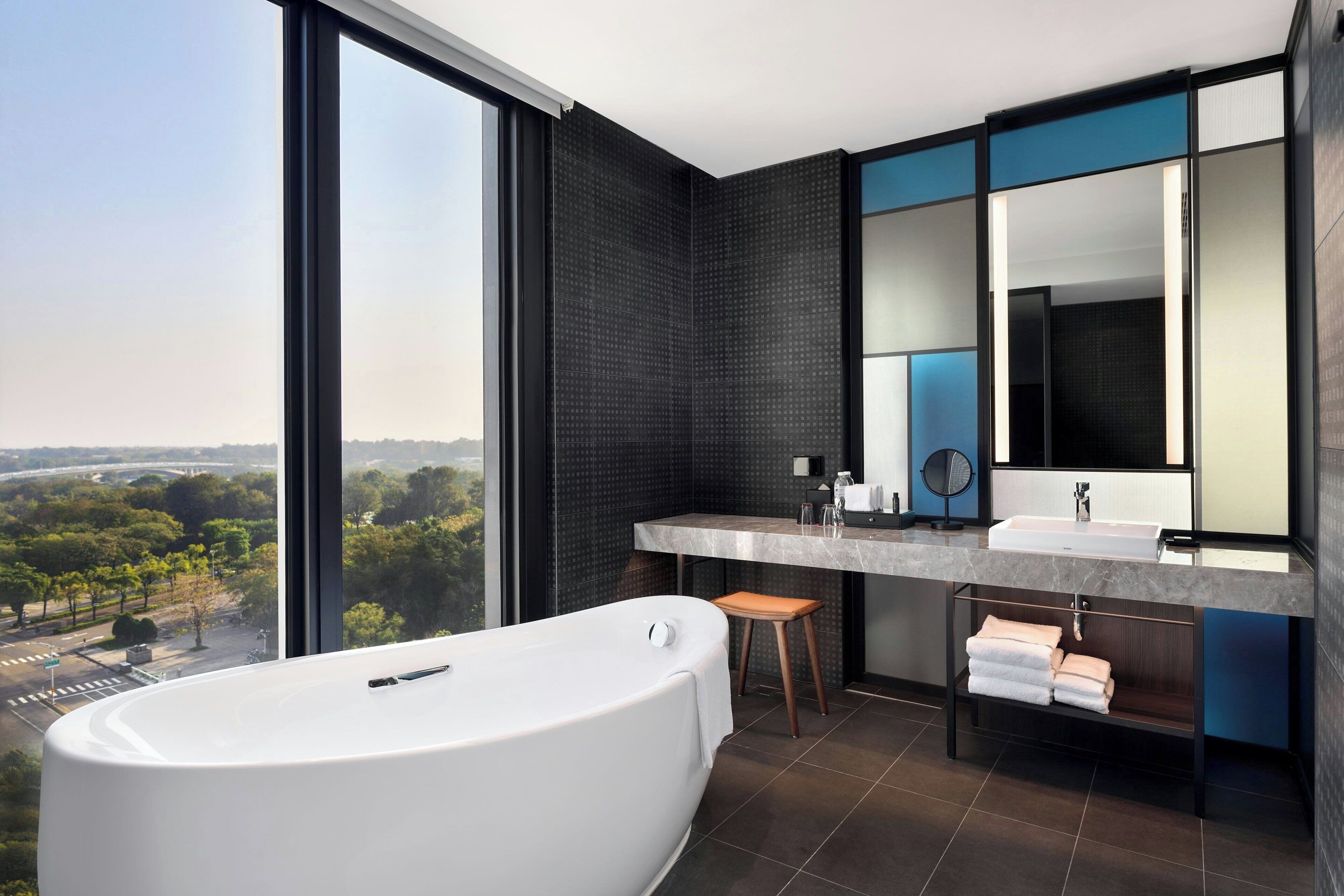 hair dryer, slippers, towels, shampoo