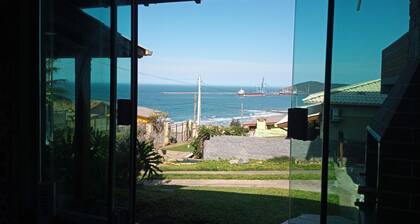 House with barbecue overlooking the sea