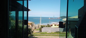 House with barbecue overlooking the sea