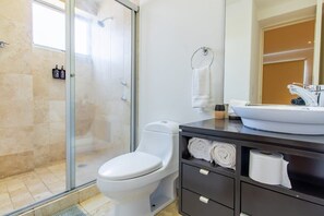 Bathtub, hair dryer, towels, soap