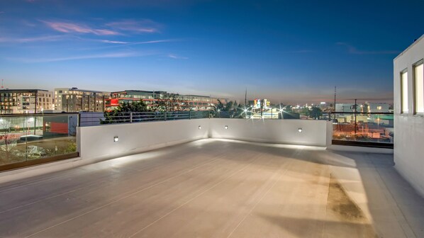 Enjoy breathtaking city views from this rooftop terrace with a clear view of the city skyline.
