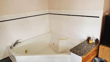 Separate tub and shower, towels