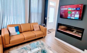 Smart TV, fireplace, books