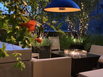 Private roof terrace with BBQ, heat lamp and outdoor sofas