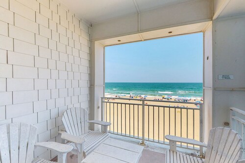 Luxury oceanfront condo on the beach with balcony & pools