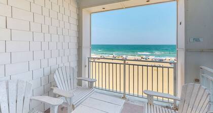 Luxury oceanfront condo on the beach with balcony & pools