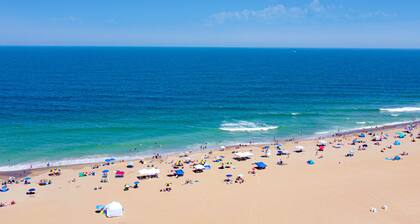 Ocean View Condo Steps from the Beach with Fast WiFi & On-Site Pool/Gym