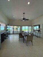 Deluxe Villa, 2 Bedrooms, Terrace, Lagoon View | Living area | Flat-screen TV
