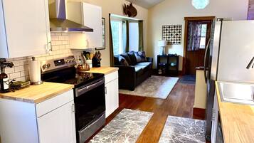 Deluxe Apartment, 1 Bedroom | Living area | Heated floors