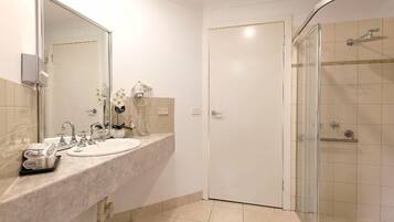 Bathtub, hair dryer, towels