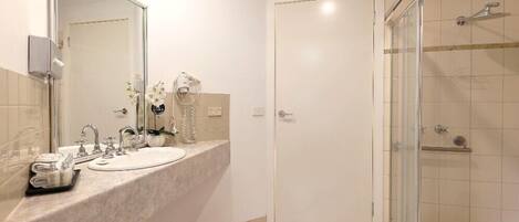 Bathtub, hair dryer, towels