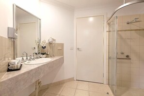 Bathtub, hair dryer, towels