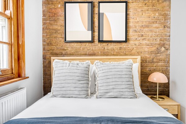 2 chambres, fer et planche à repasser, Wi-Fi, draps fournis