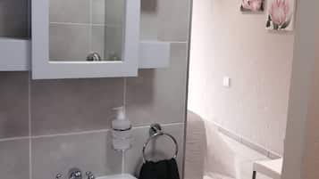 Shower, towels, toilet paper